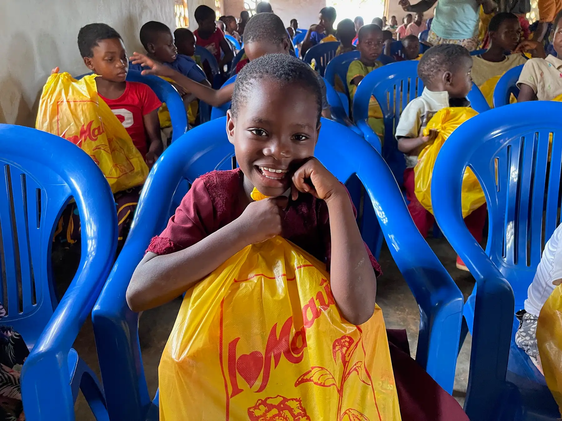 A smiling child at a Hope for the Future feeding centre in Malawi