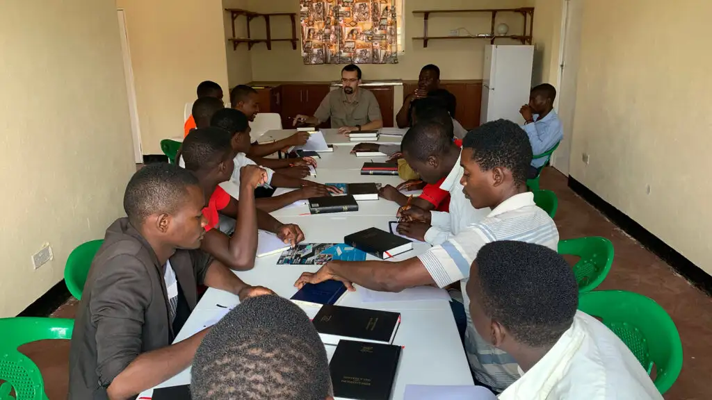 Men studying the Bible together around a table